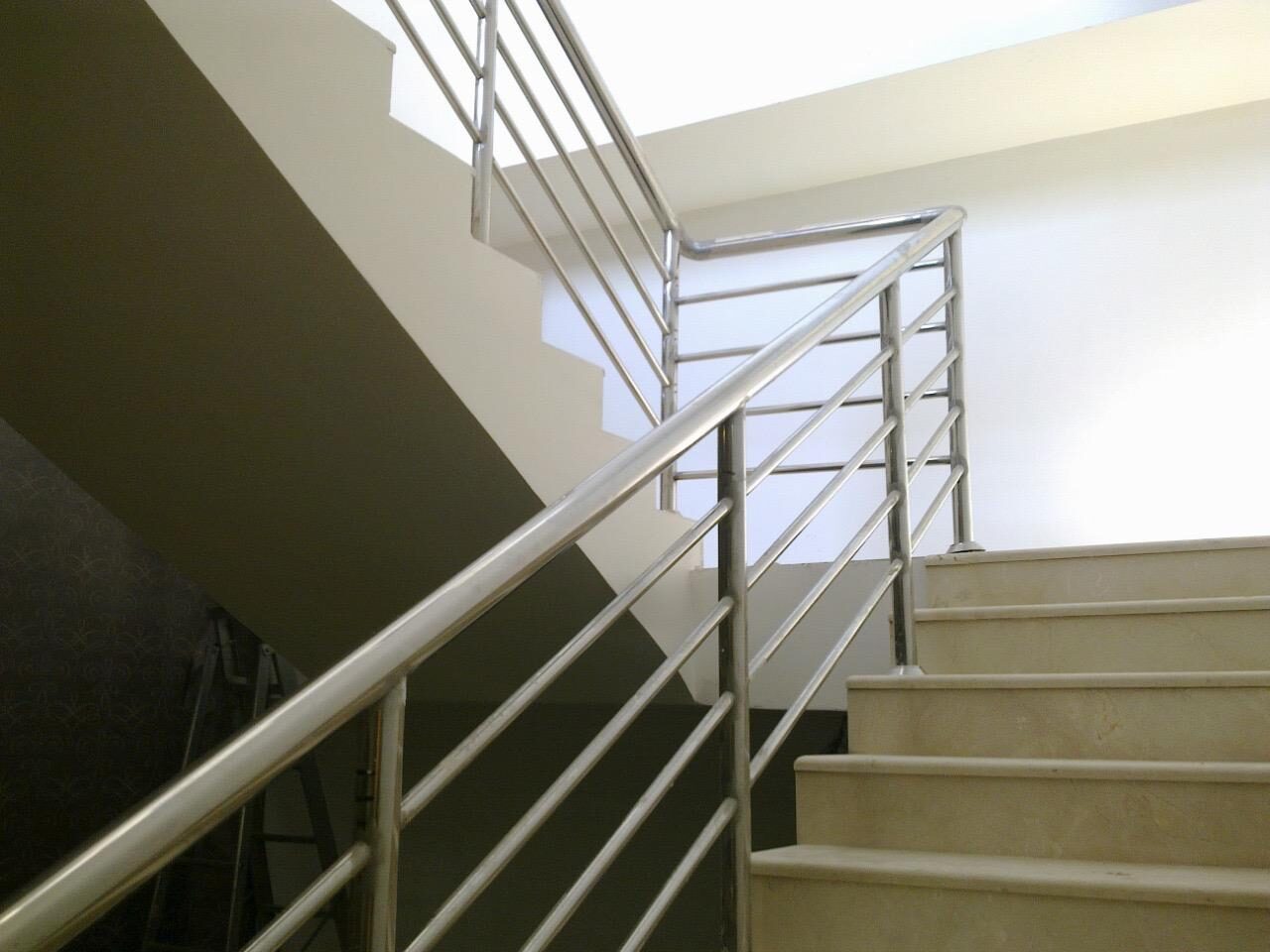 Stainless steel stair railing with horizontal bar infill